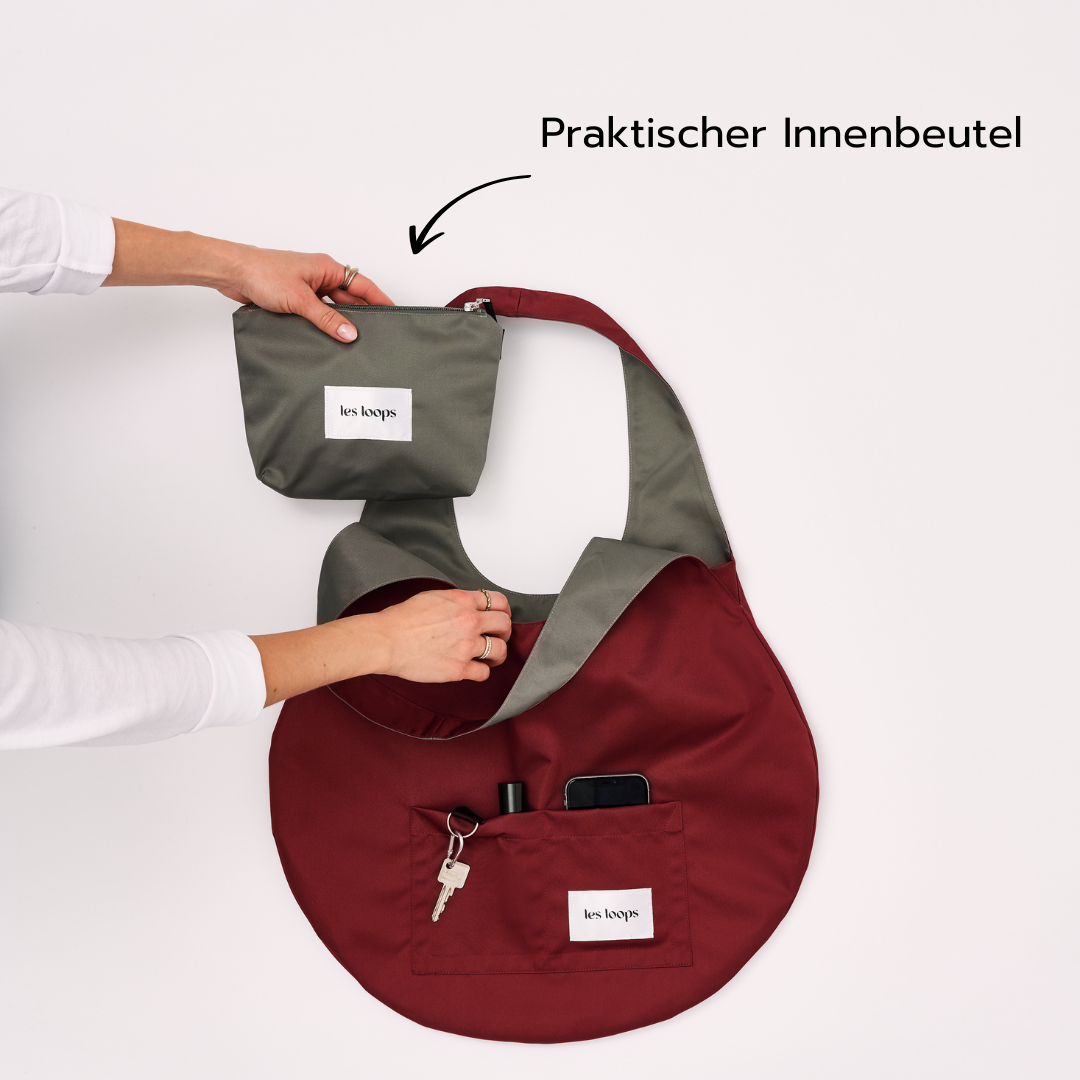 Mehr Ordnung im Shopper mit Innenbeutel in der Farbe Graugrün, darin können Kleinigkeiten aufbewahrt werden, Innenbeutel von innen fixierbar, weitere Innenfächer für schnelles Auffinden von Wertsachen