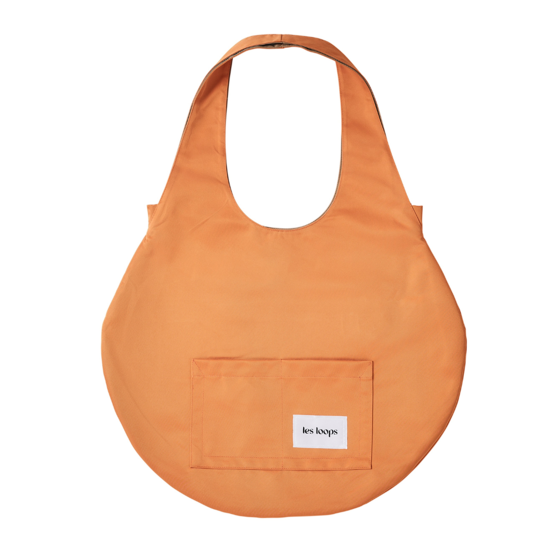 Loops Shopper Orange-Caramel Wendetasche, die Farbseite Orange kann wechselseitig mit der Farbseite Caramel getragen werden, einfach die Tasche wenden.